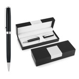 A black metal ballpoint pen displayed alongside its elegant black packaging, featuring a silver trim and a logo.