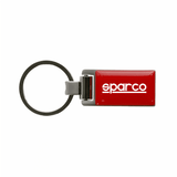 A red keychain with a metal ring, featuring a logo on a rectangular body.
