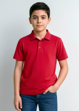 A red short sleeve polo shirt for kids, featuring a collar and three-button placket, worn by a young boy.