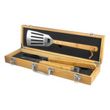 A bamboo BBQ set featuring a stainless steel spatula, tongs, and a bottle opener, presented in a wooden case.