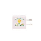 A white wall charger featuring a design with a logo and illustrations of eco-friendly elements.