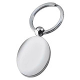 A silver key ring with a smooth, oval pendant, featuring a shiny, reflective surface and a round attachment.