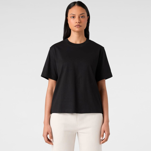 A black t-shirt with a relaxed fit and short sleeves, displayed against a neutral background.