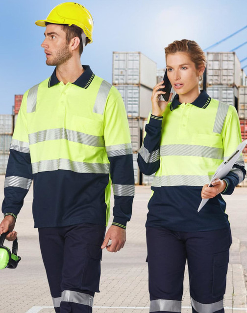 A high-visibility long-sleeve safety polo in luminous yellow and navy blue, featuring reflective stripes and logos.