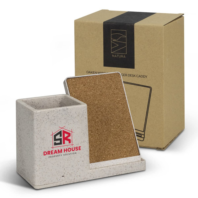 A square, speckled grey desk caddy with a cork panel, alongside a simple brown box featuring branding.