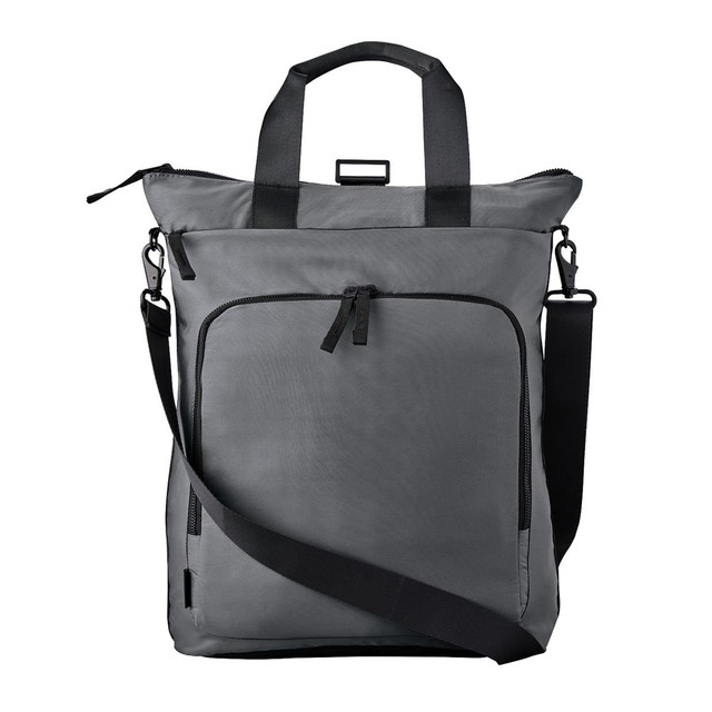 A grey tote backpack featuring dual handles, a shoulder strap, and multiple zippered pockets. Includes a logo.