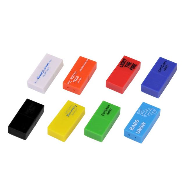 A collection of colourful brick-shaped flash drives in various shades: red, blue, green, yellow, black, and white.