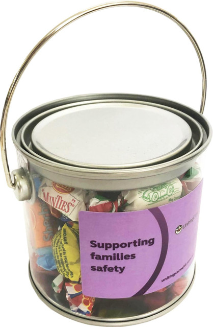 A medium silver PVC bucket filled with assorted colourful lollies, featuring a handle and a branding label.