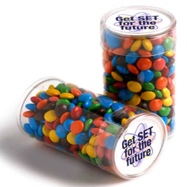 PET tubes filled with colourful M&Ms in blue, red, yellow, green, and brown, with a logo on the lid.