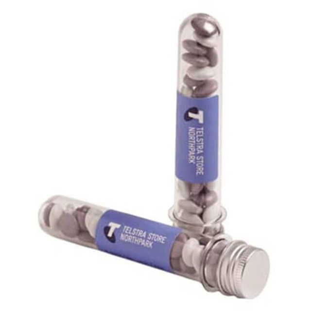 A transparent test tube filled with chocolate beans, featuring a blue label and silver lid.