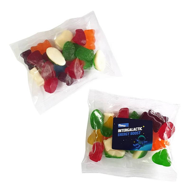 A clear bag filled with assorted mixed lollies, including gummy bears, fruit shapes, and various vibrant colours.