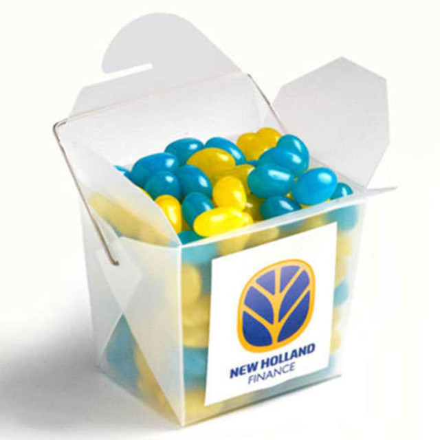 A frosted noodle box filled with yellow and blue jelly beans, featuring a logo on the front.