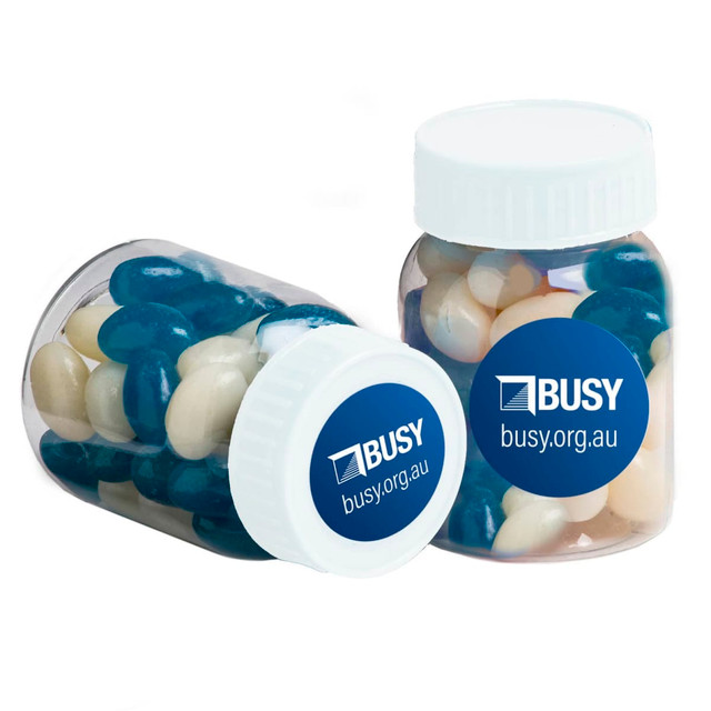 A baby jar filled with blue and white mini jelly beans, featuring a label with a logo.