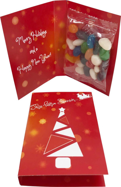 A red gift card featuring a decorative Christmas tree design, with a clear bag of colourful jelly beans inside.