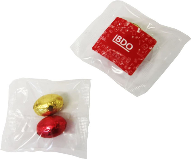Mini solid Easter eggs in gold and red foil, packaged together in clear plastic. Includes a branded item in red.