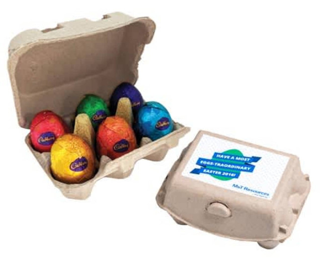 A carton containing six chocolate eggs in vibrant foil colours, with an egg carton design and a logo on top.