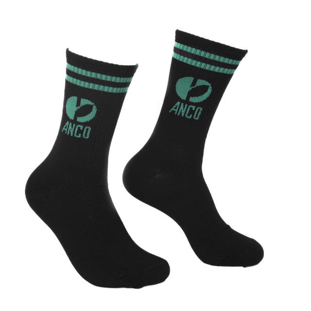 Crew Jacquard Socks in black with green stripes and a logo featuring the brand name.