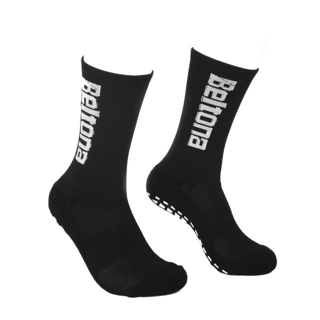 Black crew socks featuring a textured design and a logo. Suitable for various activities.