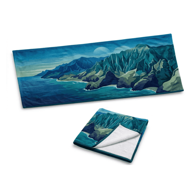 A gym towel featuring a blue and green coastal landscape design, measuring 100 x 40 cm, with a soft, white interior.