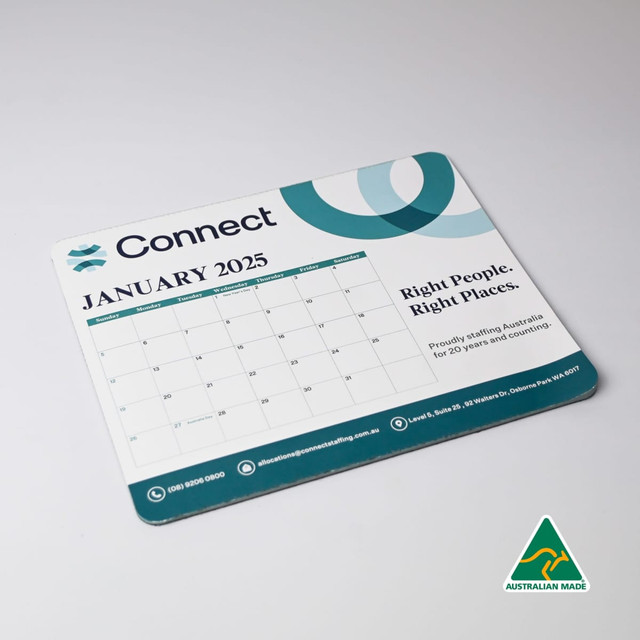 A mouse mat featuring a calendar for January 2025, in blue and green tones, with a logo and Australian-made badge.