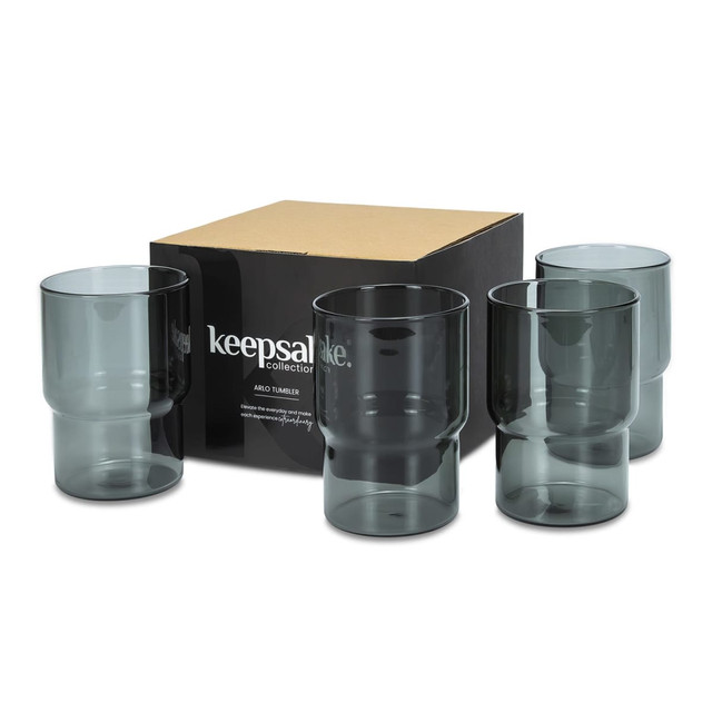 A set of four smoky grey tumblers in a box, featuring a sleek design with a logo.
