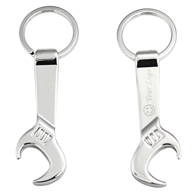 A keychain in the shape of a shiny silver wrench, featuring a circular ring for attachment and a branding area.