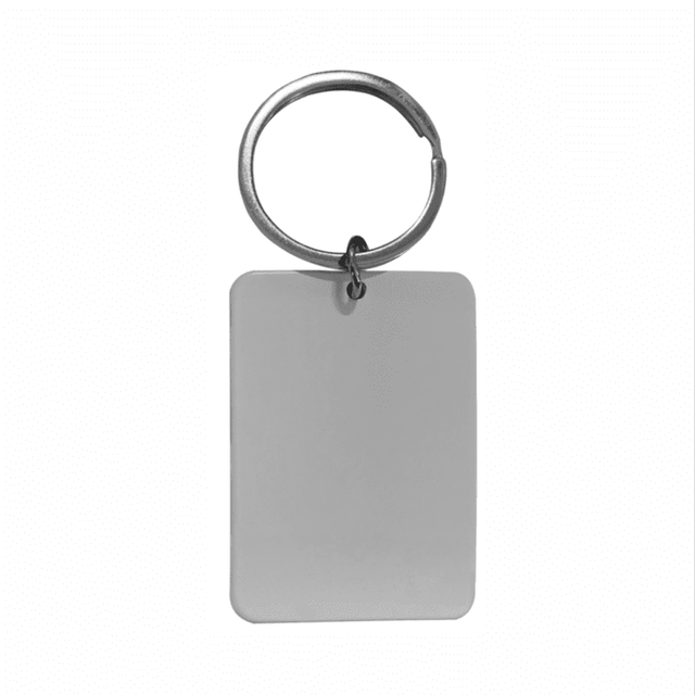 A keyring with a rectangular silver tag attached, featuring a plain surface and a metal loop.