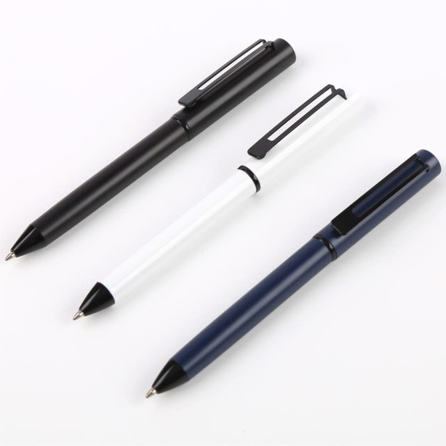 A set of three metal pens in black, white, and navy blue, each with a clip and a sleek design.