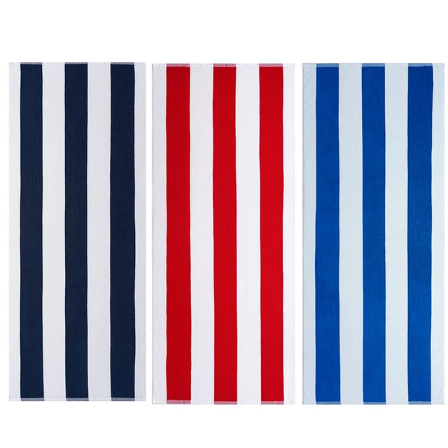 Three striped blankets in navy blue, red, and light blue, featuring alternating vertical stripes. Each blanket has a logo.