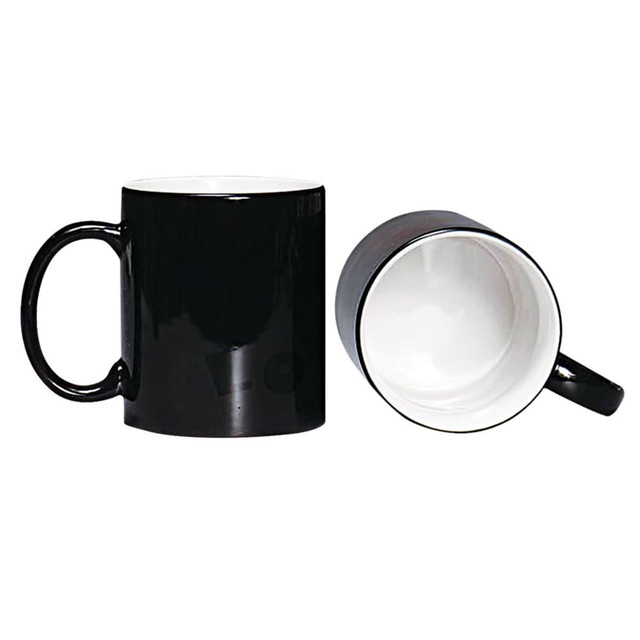 A coffee mug with a glossy black exterior and a white interior, featuring a handle and a simple design.