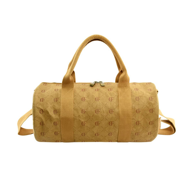 A yellow Manila Kraft paper duffle bag with handles and a shoulder strap, featuring a subtle logo pattern.