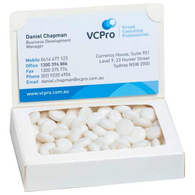 A boxed set of white mints, featuring a logo and a business card on the front.