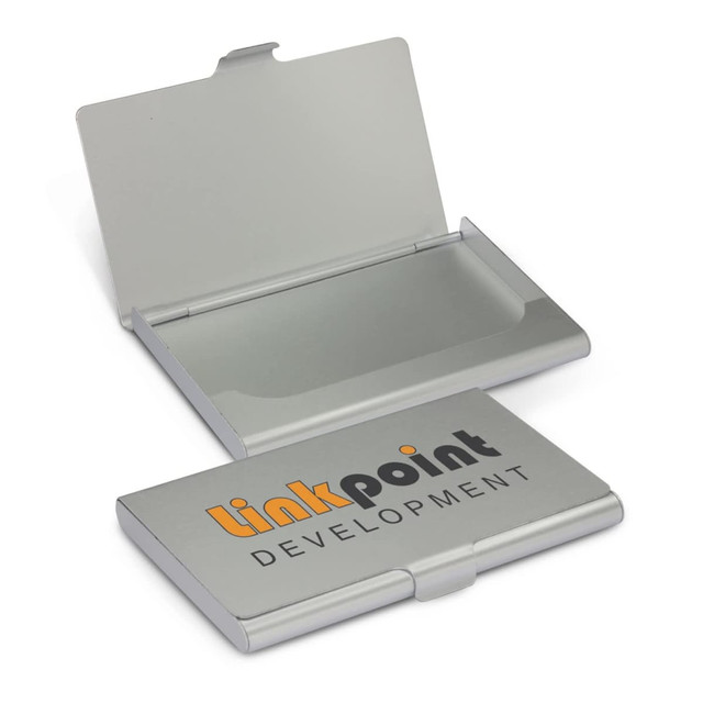 A silver aluminium business card case with a clasp, featuring a logo on the front.