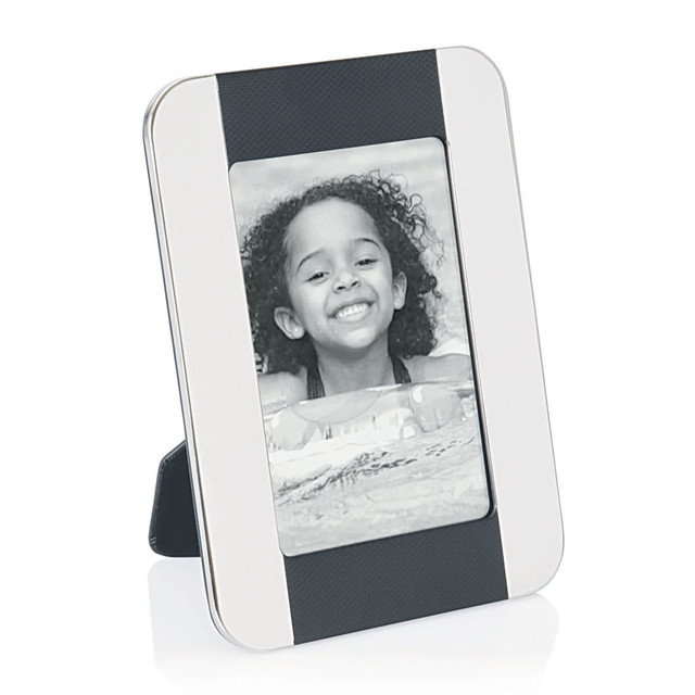 A photo frame in silver and black featuring a smiling child in a black-and-white image. The frame has a logo.