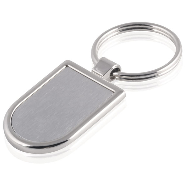 A silver keyring with a polished surface and a round attachment loop. It features a rectangular tag design.