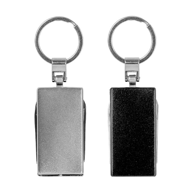 A multi-tool keyring in silver and black, featuring a smooth rectangular shape and a metal ring for attachment.