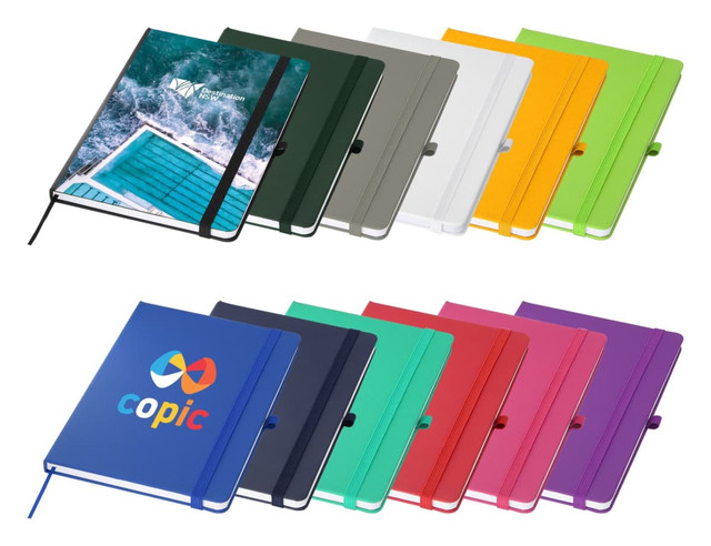 A collection of Bio rPET A5 Notebooks in various colours, featuring a logo on one of the covers.