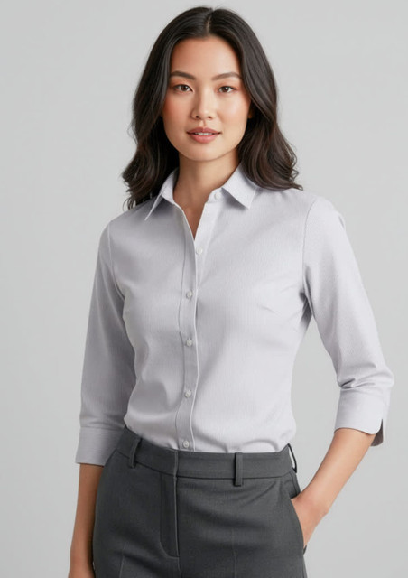 A light grey women's button-up shirt with 3/4 sleeves, featuring a collar and a front button closure.