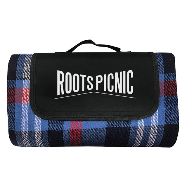A picnic blanket featuring a navy, red, and grey plaid pattern, with a black carrying handle and logo.
