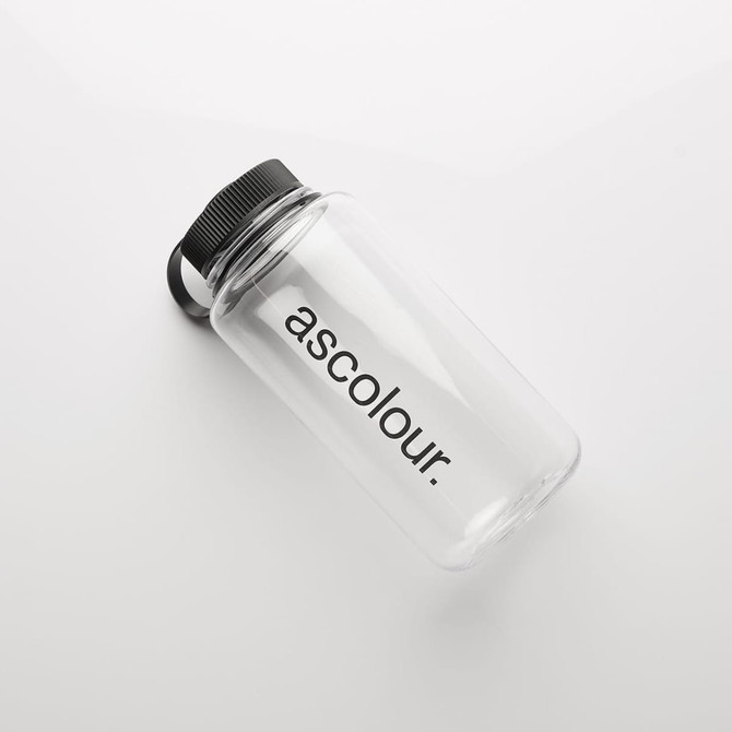 A drink bottle in clear plastic with a black screw-on lid and a logo on the side.