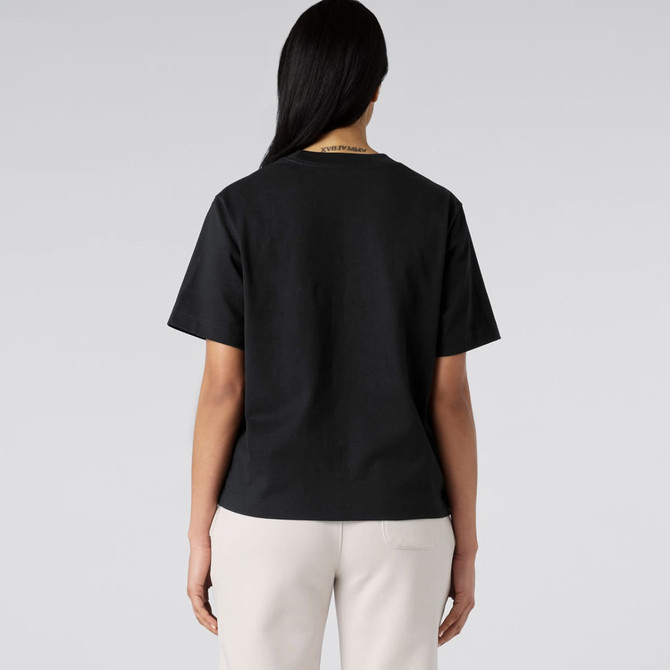 A back view of a black tee shirt, featuring short sleeves and a relaxed fit. The fabric appears smooth and casual.