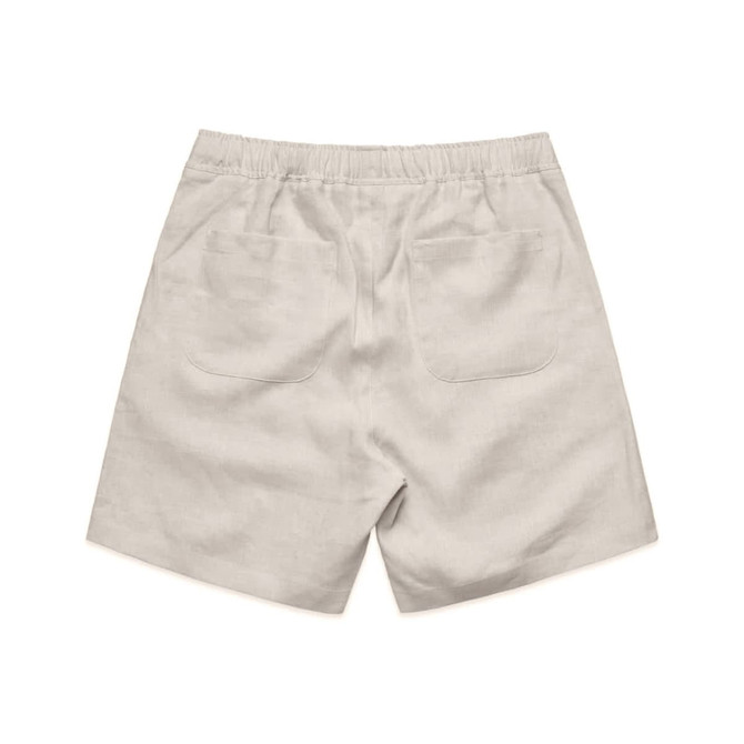 Linen shorts in a light beige colour featuring an elastic waistband and two back pockets.