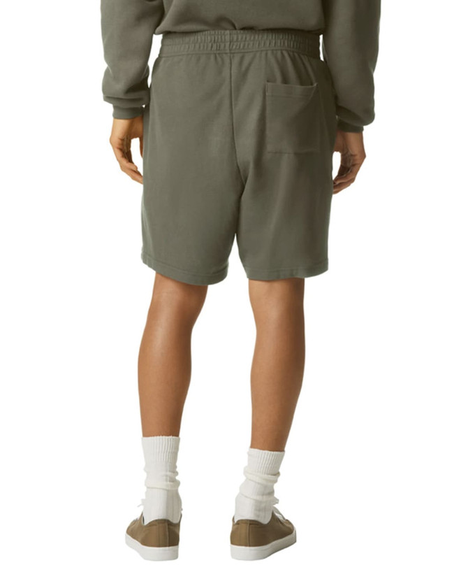 Unisex gym shorts in olive green, featuring an elastic waistband and a back pocket. Includes a logo.