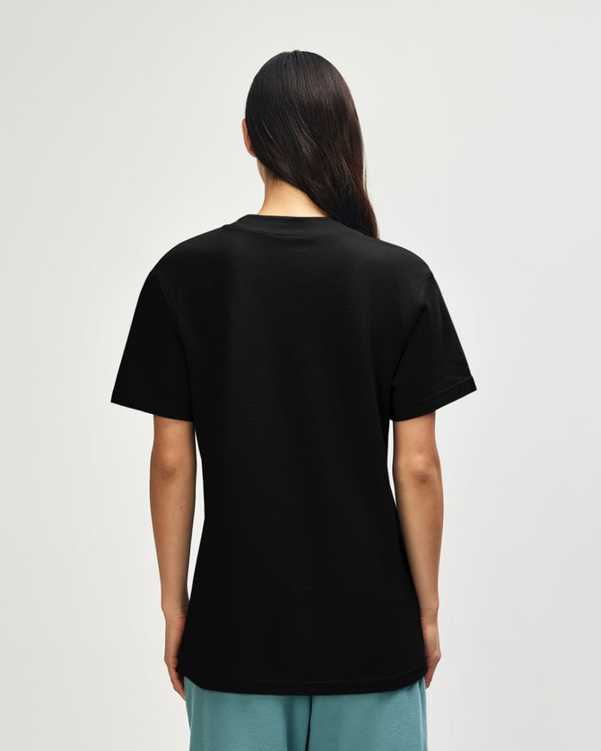 A black unisex pique mockneck t-shirt featuring a simple design and a logo on the back.