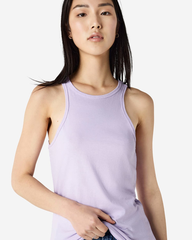 A light purple women's racerneck tank top with a fitted style and a branding logo.