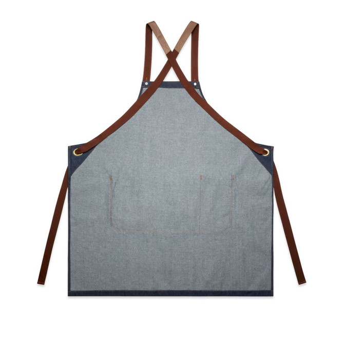 A denim apron in blue with brown straps, featuring a pocket at the front and a logo.