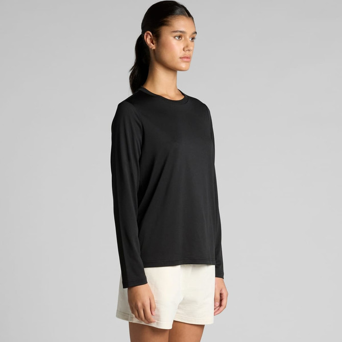 A black long-sleeve T-shirt displayed on a model, paired with light-coloured shorts. The shirt features a logo.