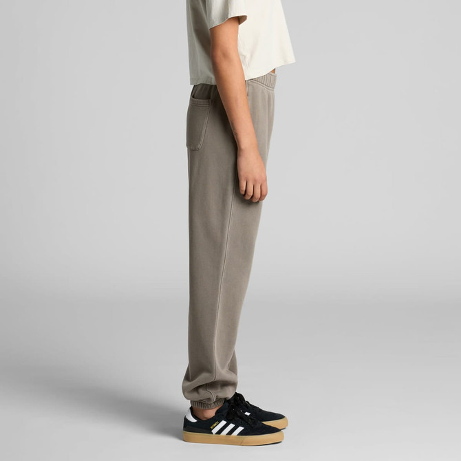 Faded grey track pants with an elastic waistband and side pockets, displayed on a model.