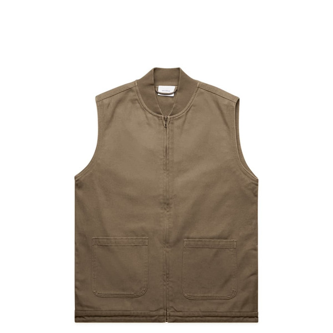 A heavy canvas vest in khaki colour with a front zip and two large pockets. It features a branding label inside.
