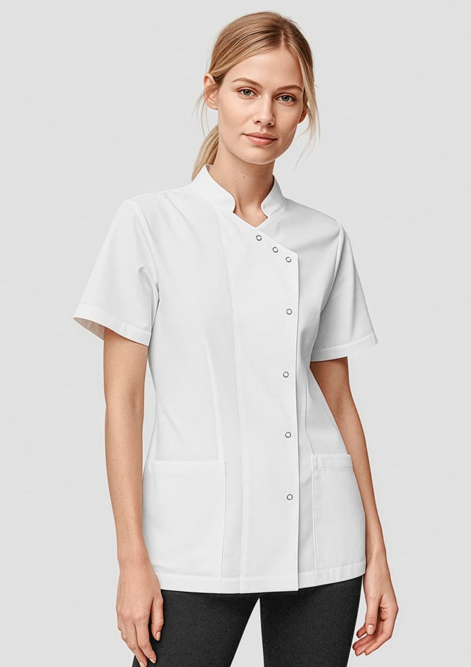 A white short-sleeve top with a mandarin collar, featuring a button closure and front pockets. It has a branding logo.